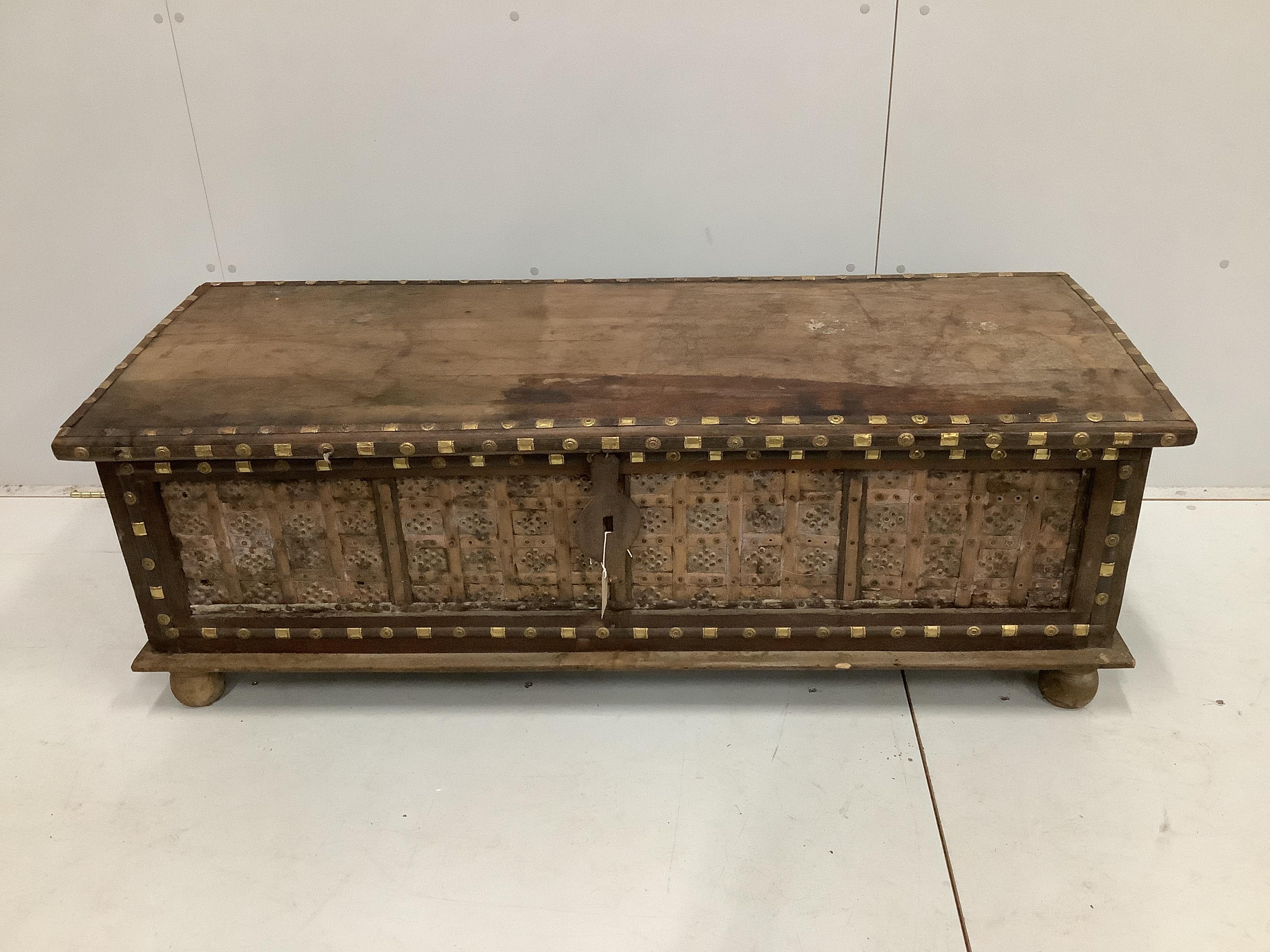 A Zanzibar style brass mounted hardwood coffer, width 145cm, depth 55cm, height 49cm